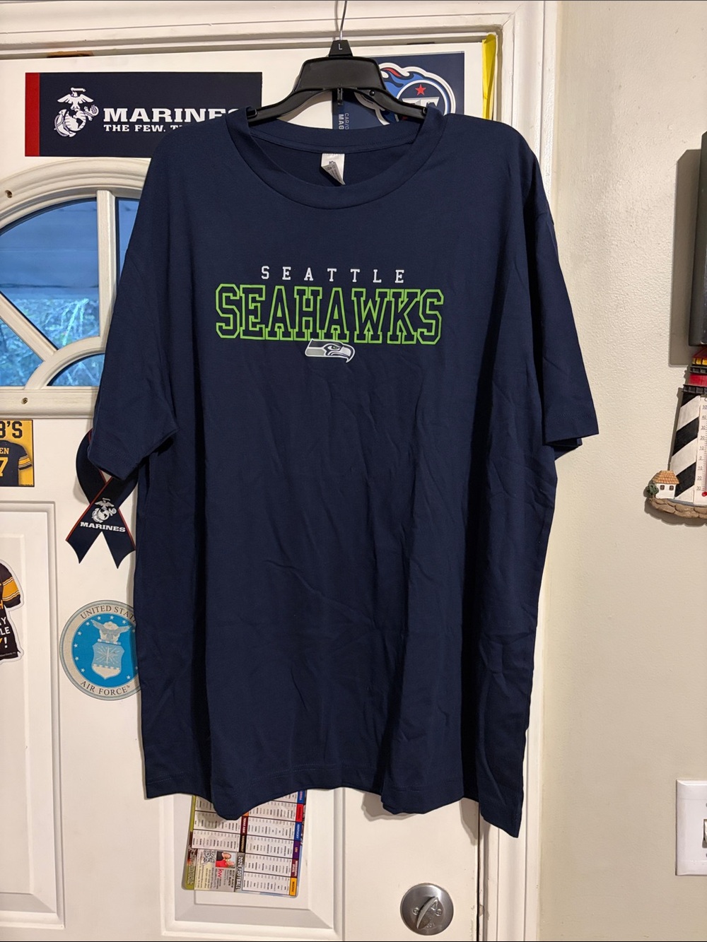 NFL Seattle Seahawks Navy T-Shirt with Neon Green Logo. NWOT